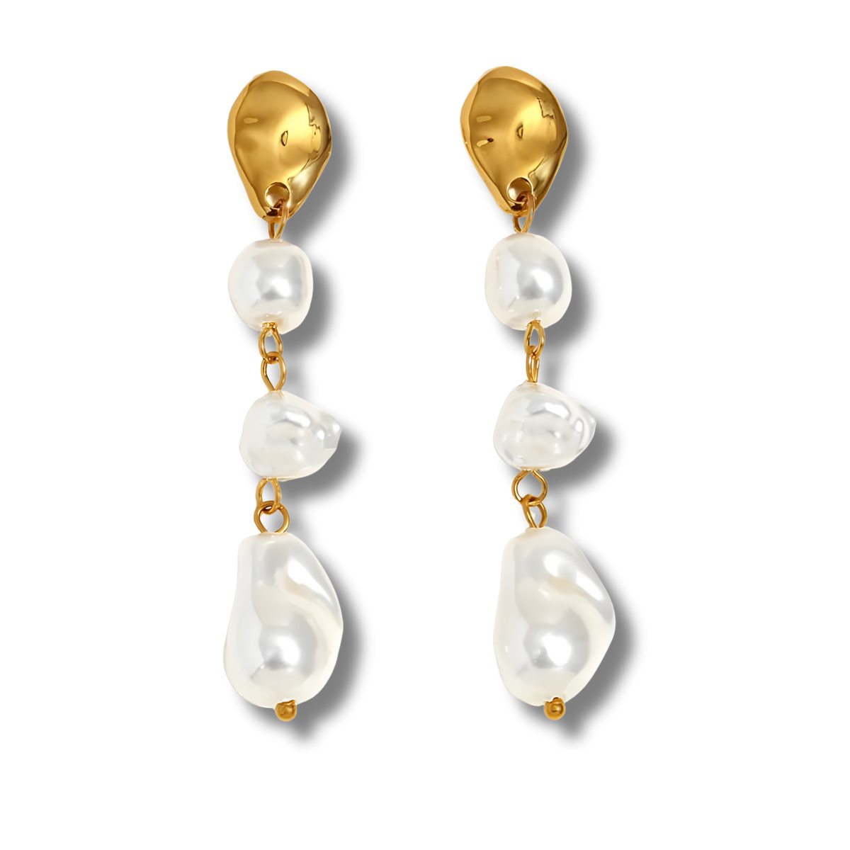 Pendientes largos con perlas en estilo moderno para looks de noche