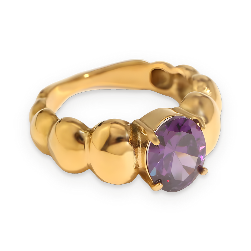 Anillo solitario de piedra morada en acero dorado