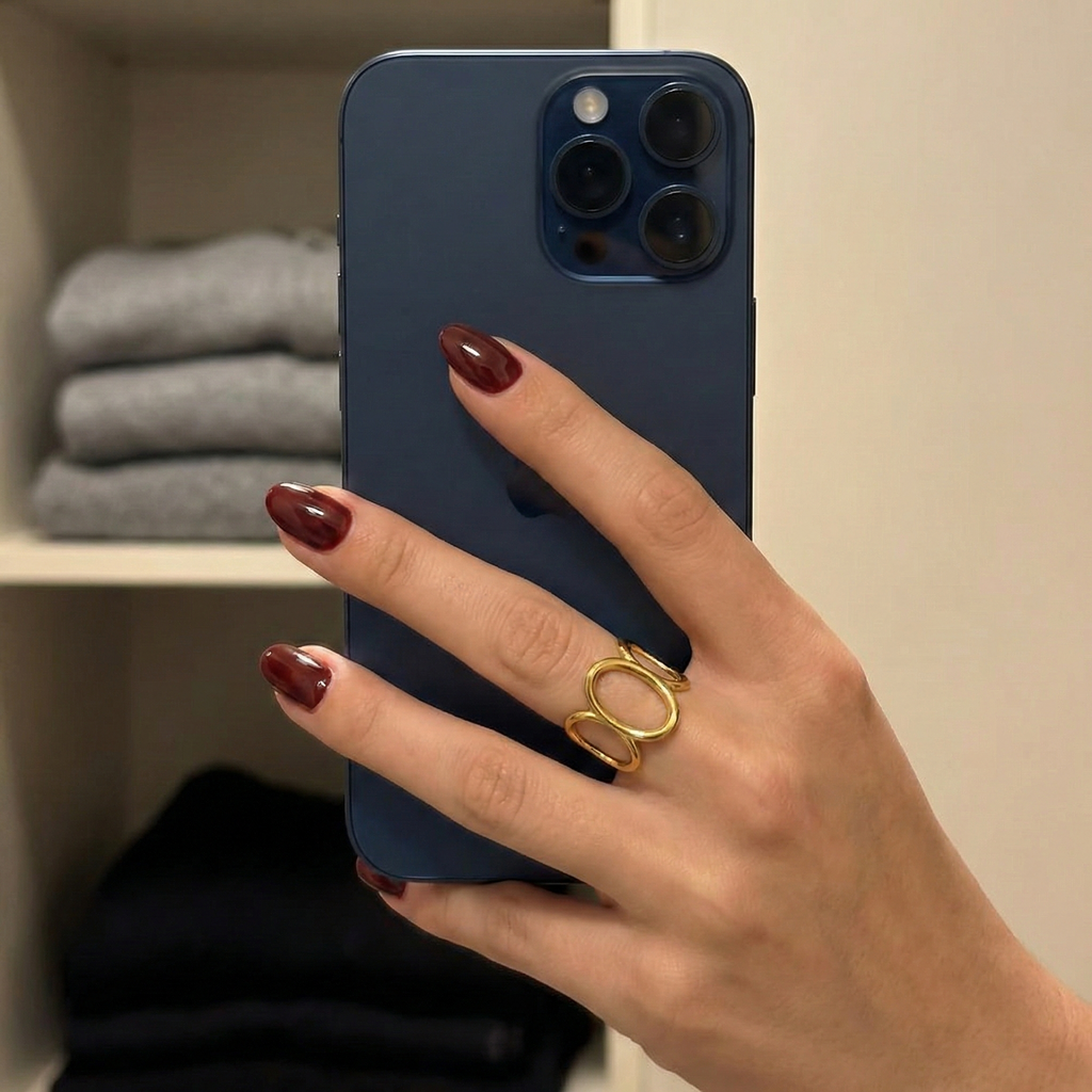 Anillo abierto de tres óvalos en acero dorado