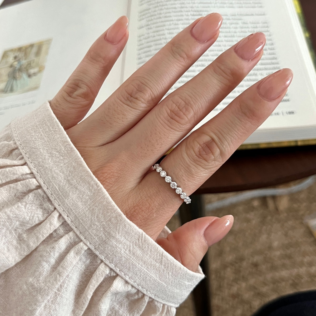 Anillo media alianza de moissanitas 0,63 ct en plata