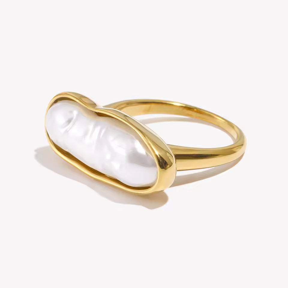 Anillo de perla en acero dorado