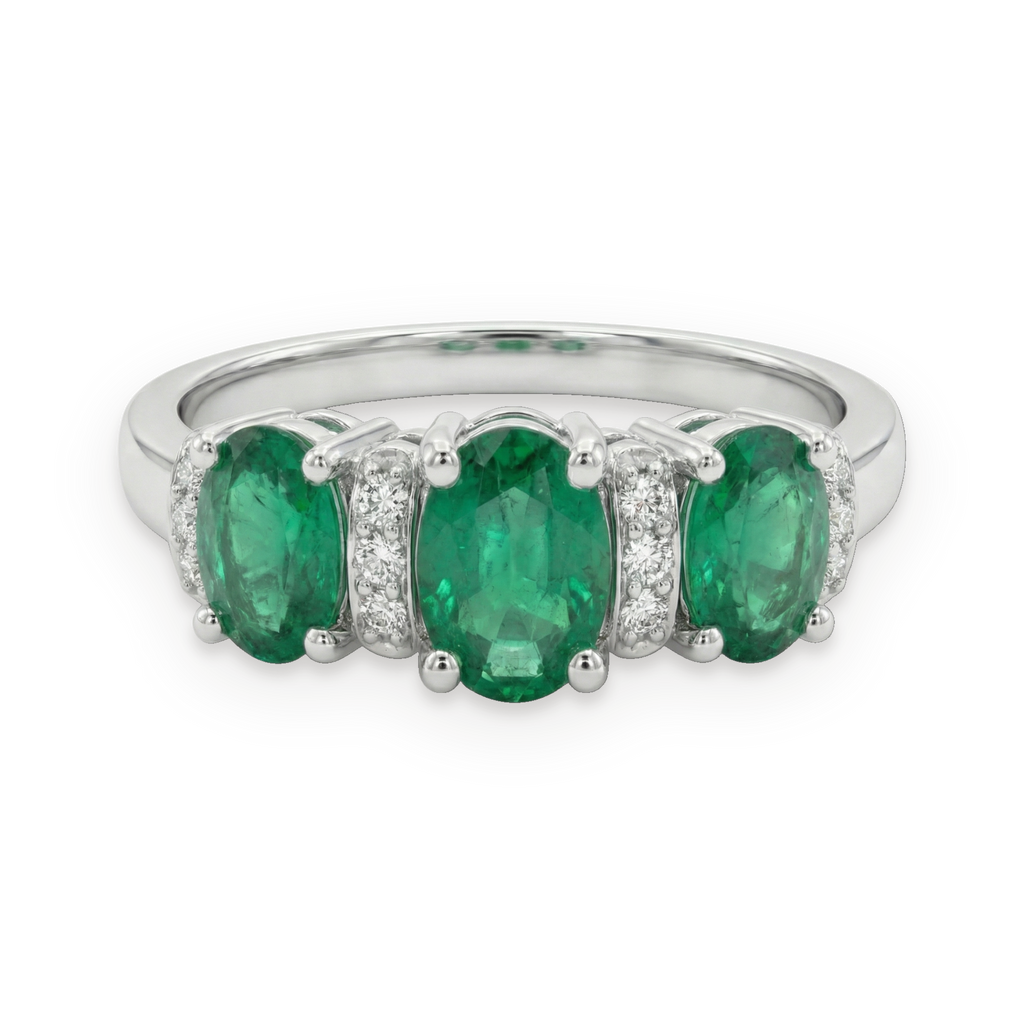 Anillo de tres piedras de esmeraldas y diamantes en plata