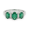 Anillo de tres piedras de esmeraldas y diamantes en plata