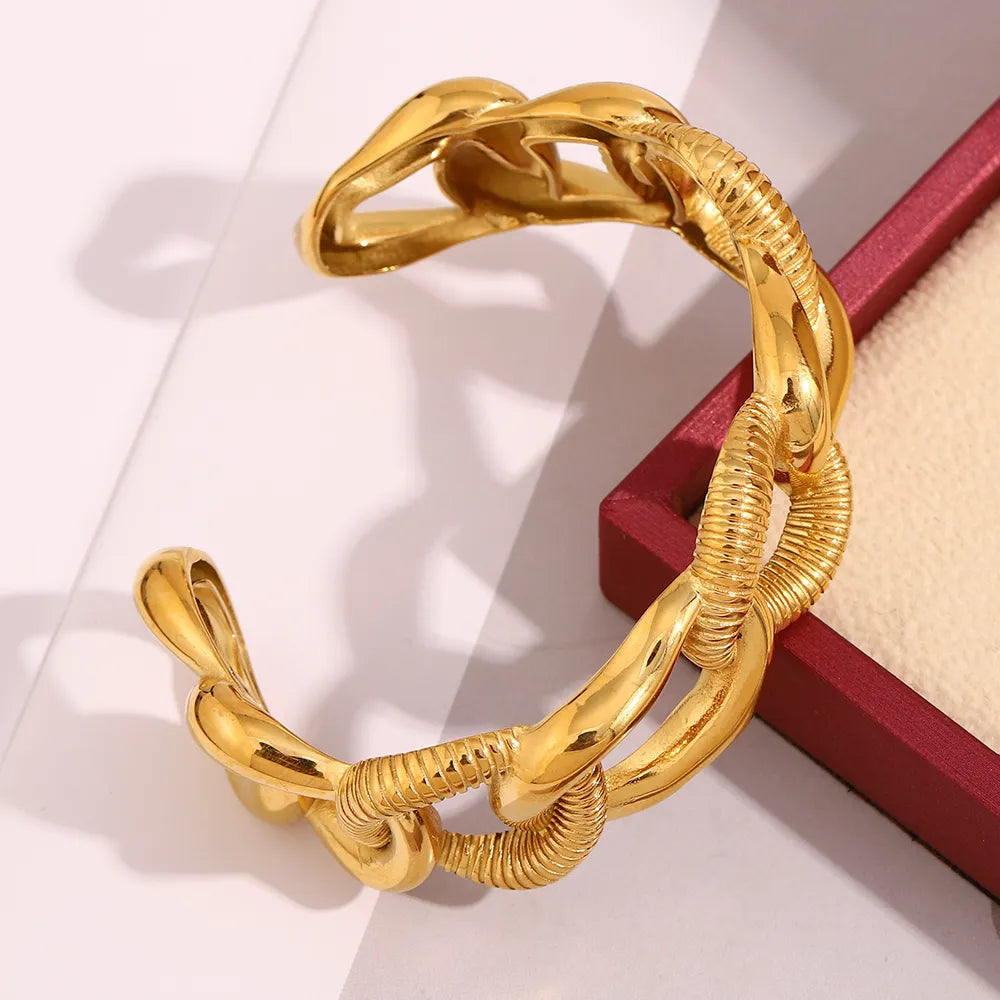 Pulsera brazalete de eslabones en acero dorado