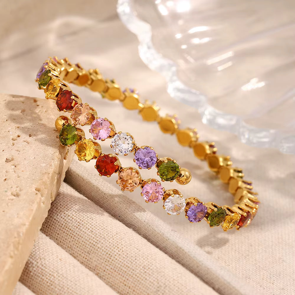 Pulsera geométrica de circonitas multicolor en acero dorado