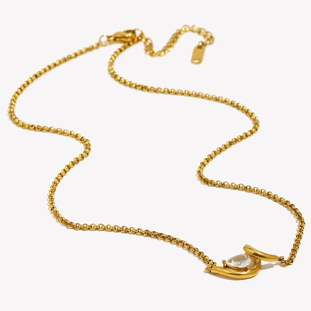 Collar con gota de circonita en acero dorado