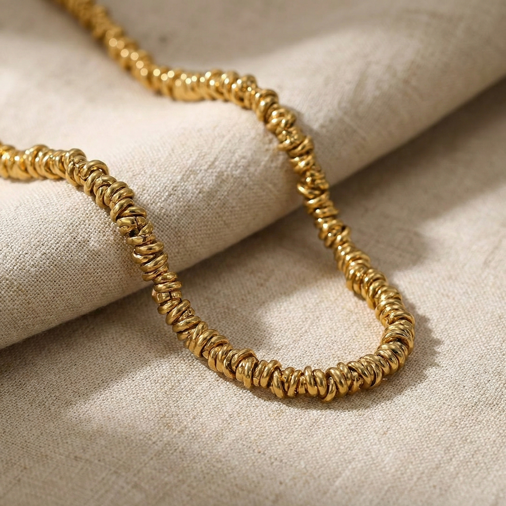 Collar de aros en acero dorado