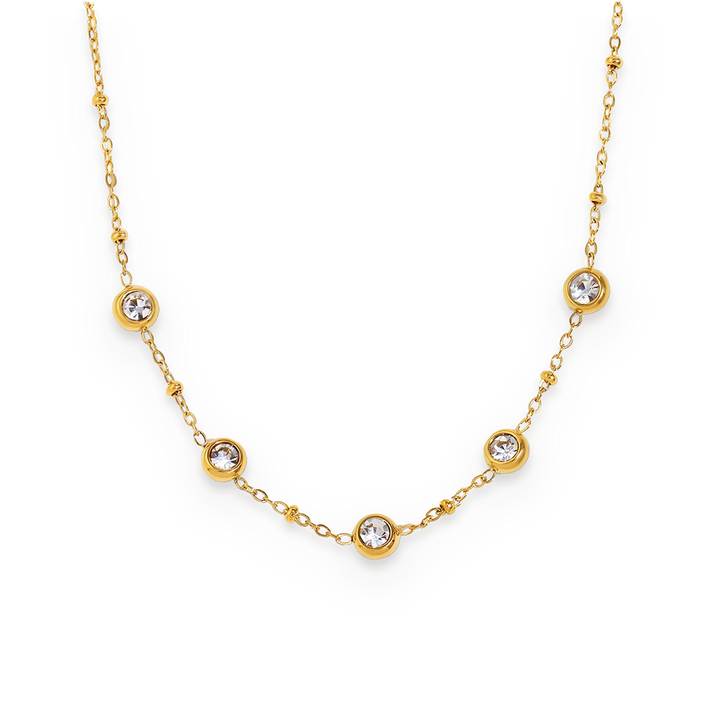 Collar con engaste en bisel de circonitas en acero dorado