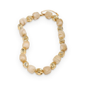 Collar de cuentas efecto marfil en acero dorado