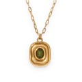 Collar con colgante ovalado de circonita en acero dorado