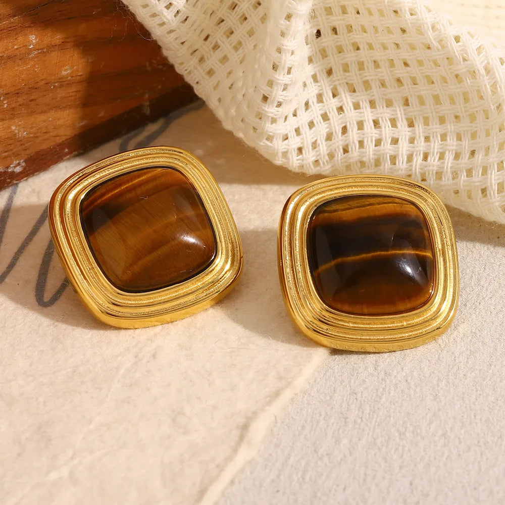 Pendientes de cabujón de piedra marrón en acero dorado