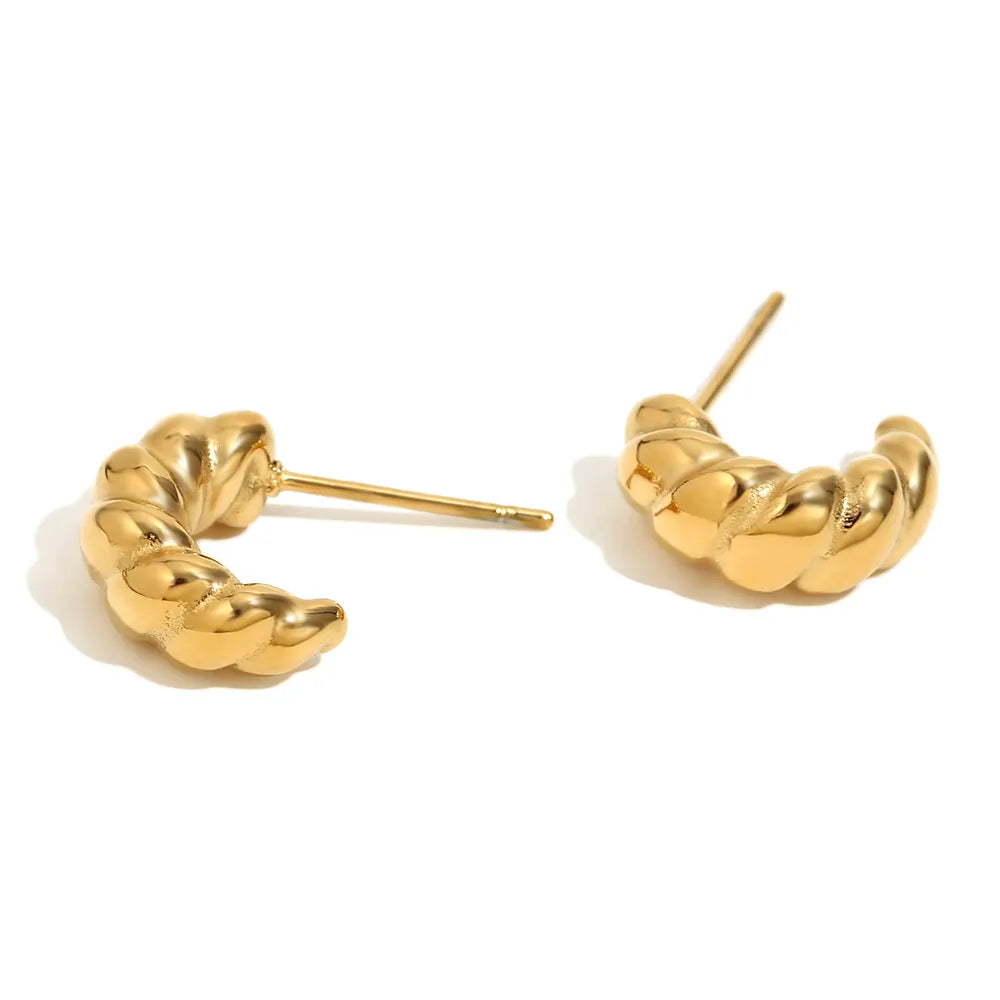 Pendientes de aro con relieve trenzado en acero dorado