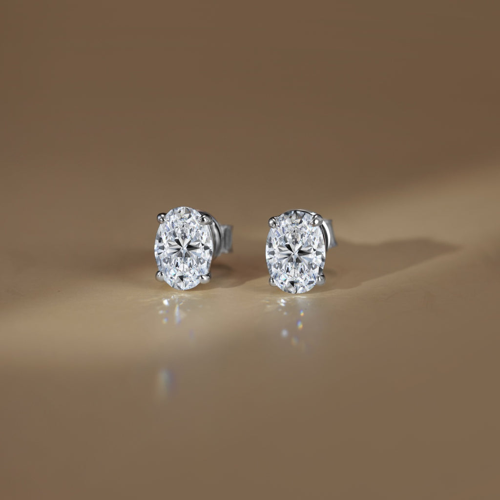 Pendientes de botón de moissanitas 2 ct en plata