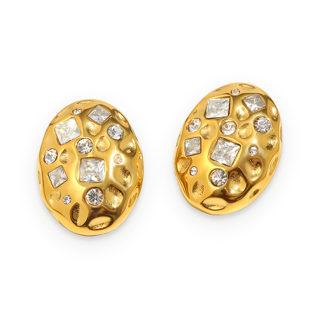 Pendientes ovalados de circonitas en acero dorado
