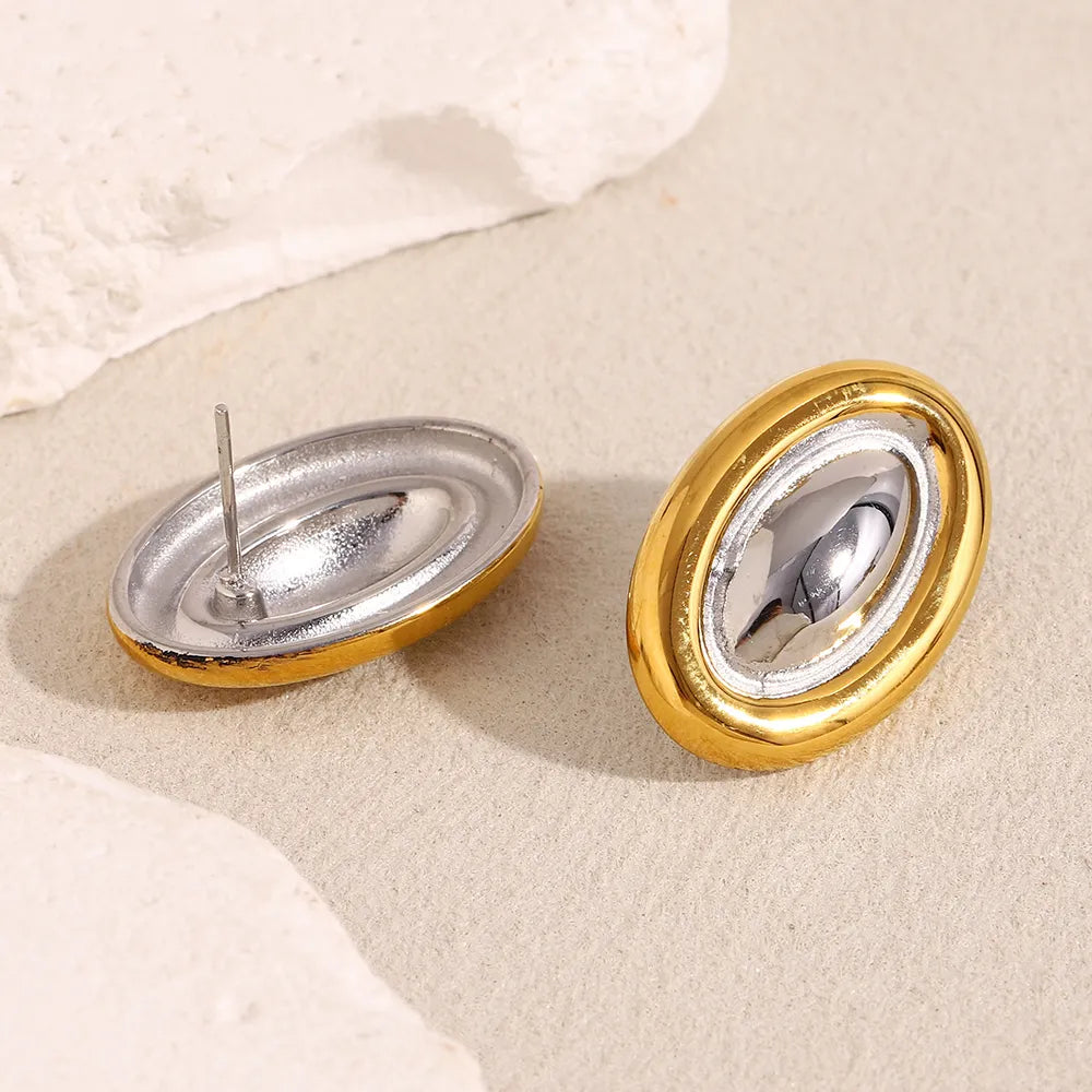 Pendientes ovalados bicolor en acero dorado