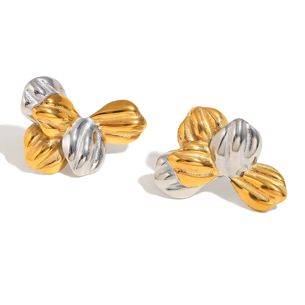 Pendientes de hojas bicolor en acero dorado