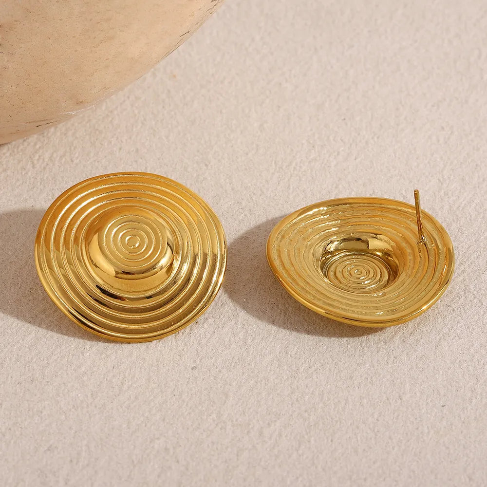 Pendientes de círculos concéntricos en acero dorado
