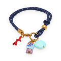 Pulsera de cordón con charms marinos en acero dorado
