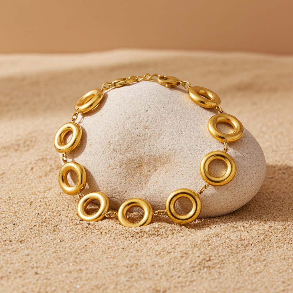 Pulsera de círculos pulidos en acero dorado