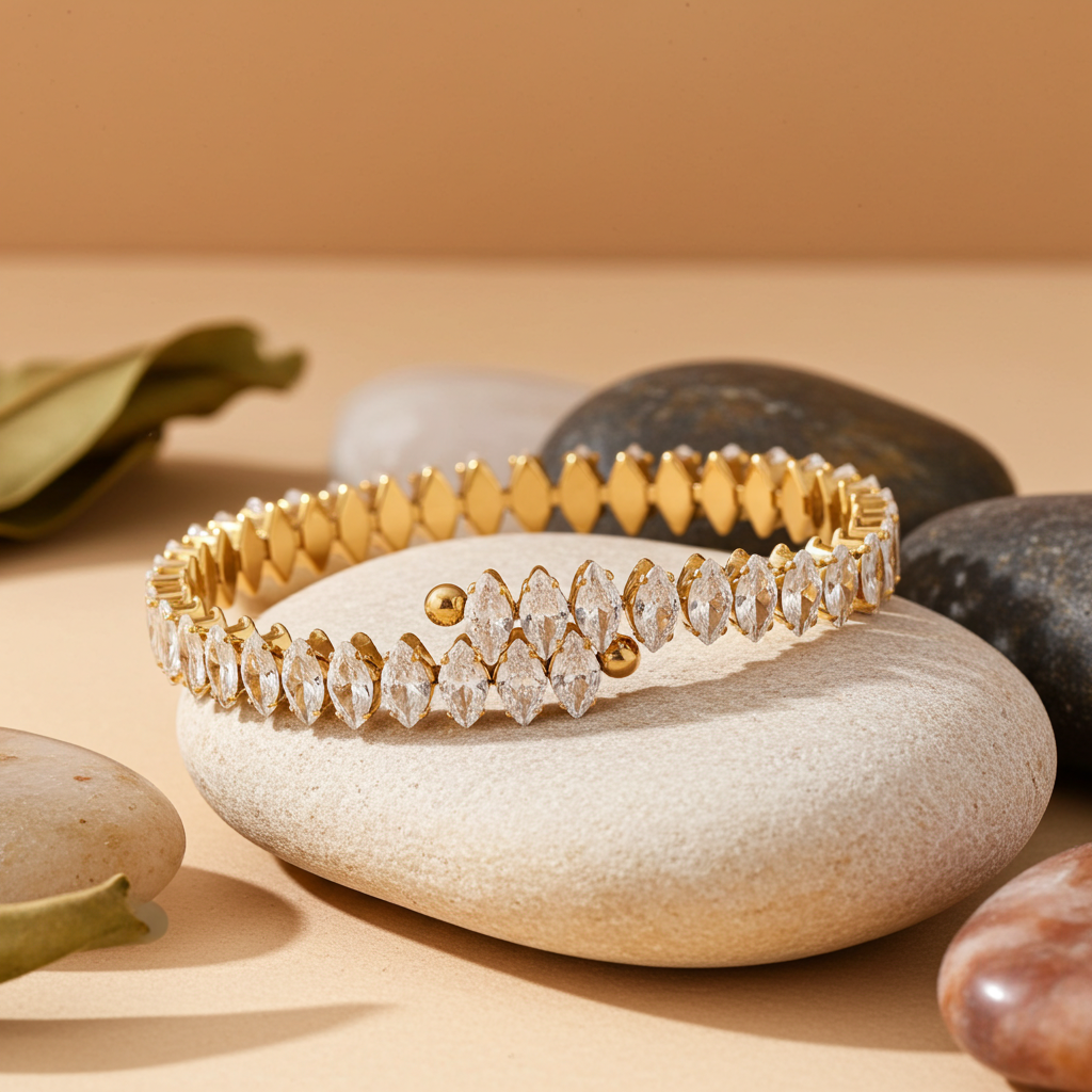 Pulsera tenis abierta de circonitas en acero dorado